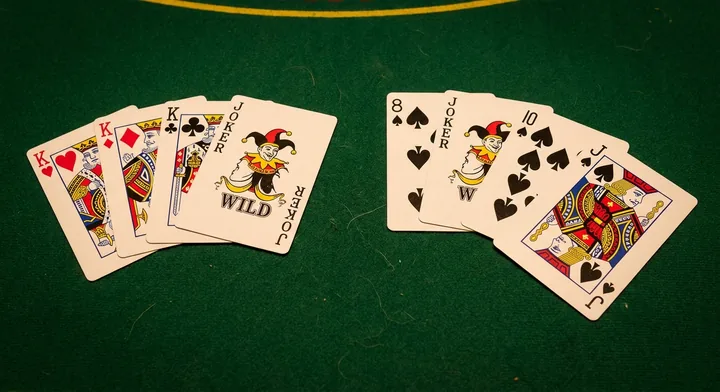 Melds in Contract Rummy: a set of matching ranks and a run of one suit