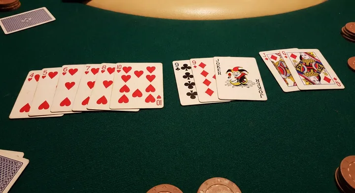The goal of Indian Rummy: a finished hand arranged into valid melds
