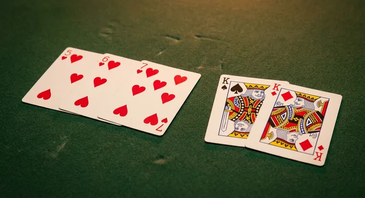 The goal of Tonk: a finished hand arranged into valid melds